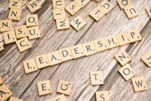 A blog post photo showing a scrabble board with the word leadership.